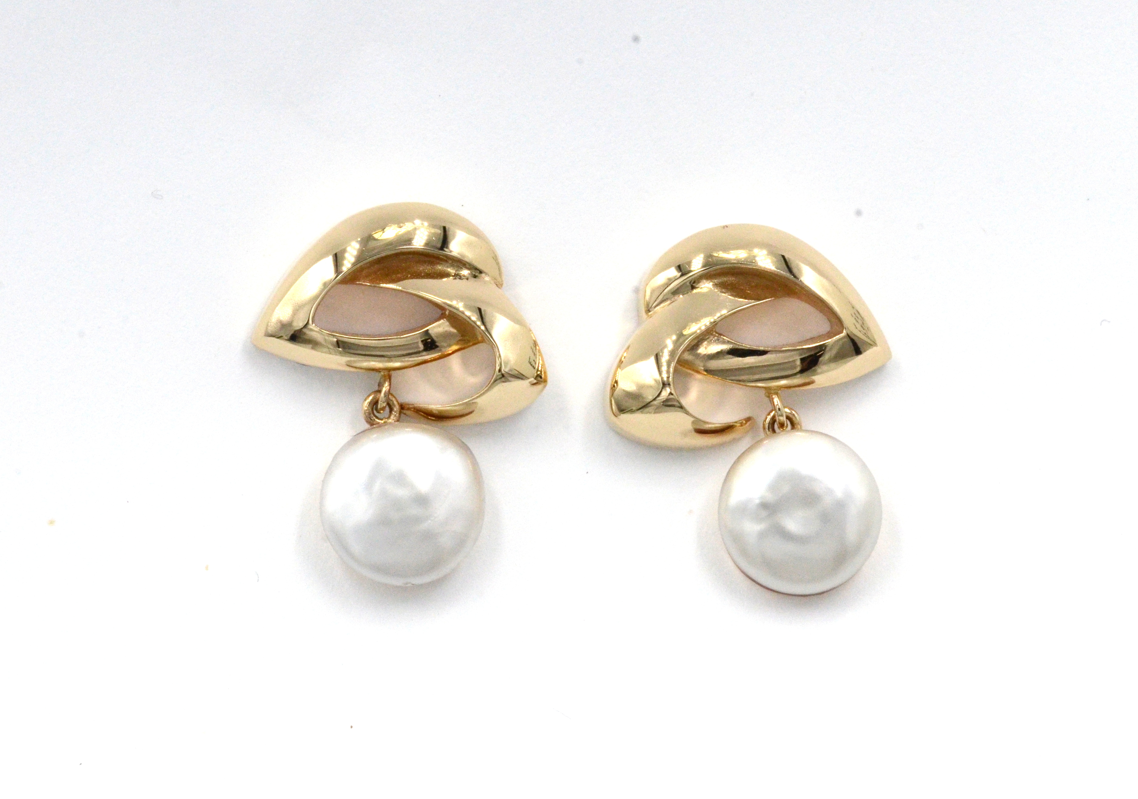  Traditional post  earrings with a dimensional design with beautiful luster button pearls that dangle. Very classy. Can be converted to Euro Charms upon request.